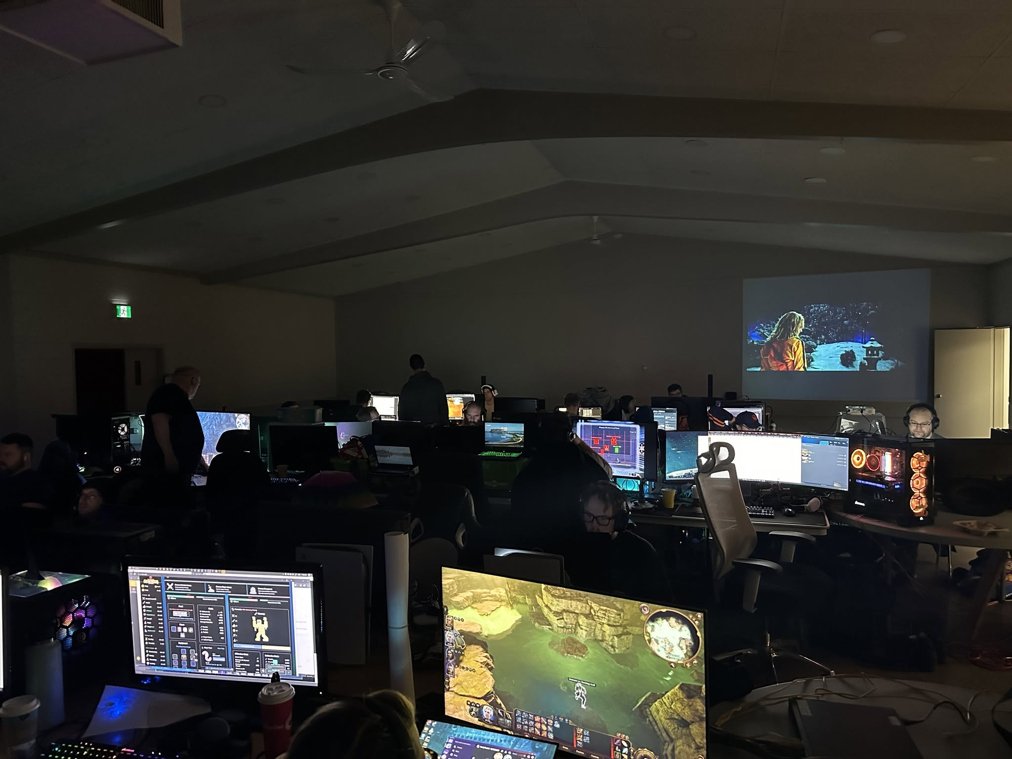 Rows of PC gamers playing together at a MegaFPS LAN